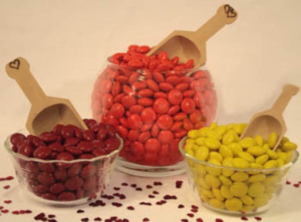 Wood scoops, small with hearts burned into the handle.